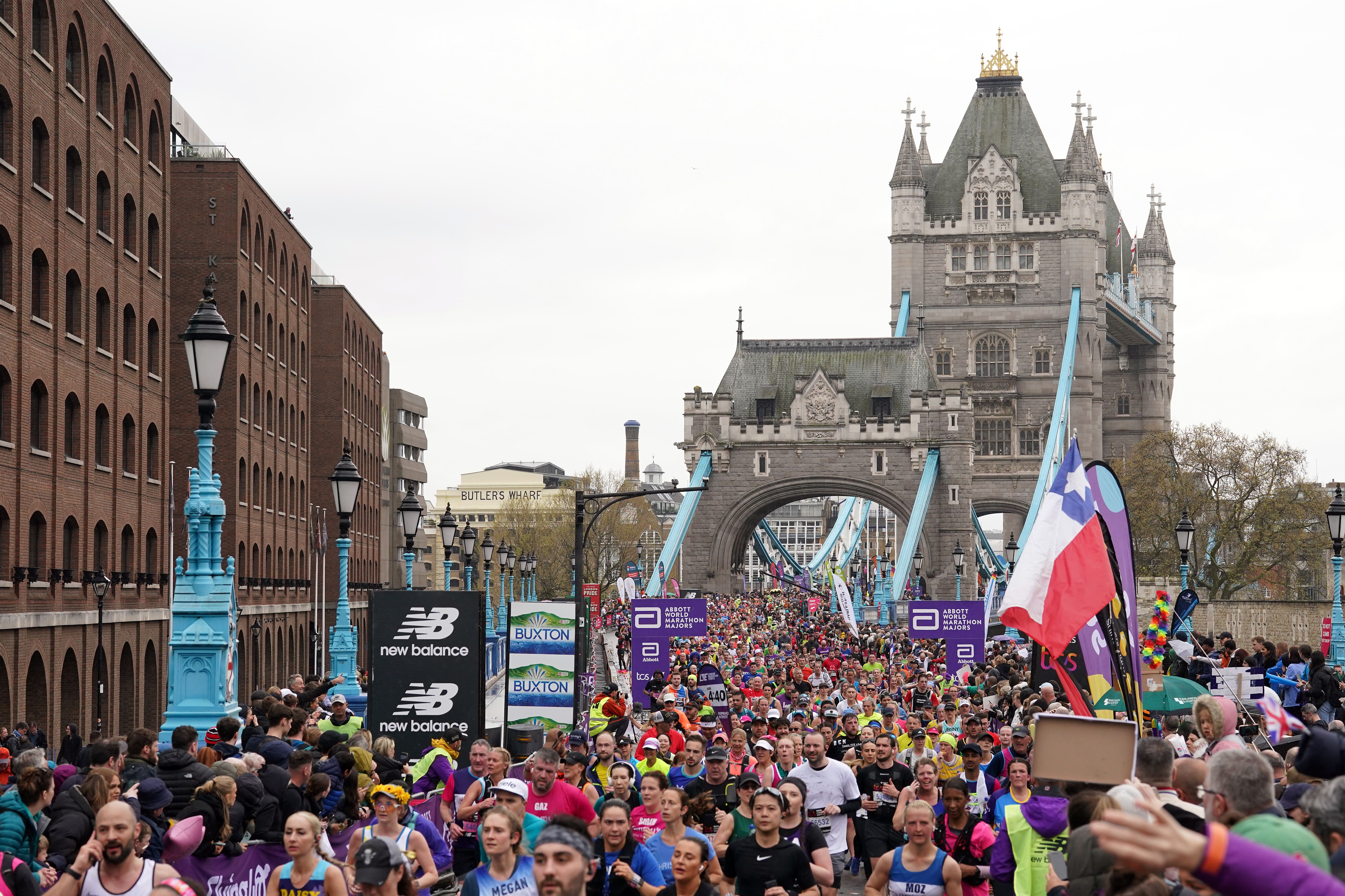 Runners pass over Tower Bridge in Sunday’s race