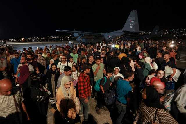 <p>Jordanians evacuated from Sudan arrive at a military airport in Amman, Jordan</p>