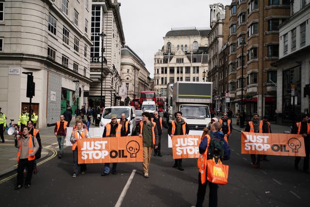 <p>Just Stop Oil protesters taking part in a slow march protest through London as part of the group’s campaign to convince the Government to end all new oil and gas projects in the UK (Jordan Pettitt/PA)</p>