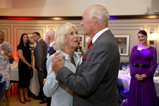 The Duchess of Cornwall dances with Len Goodman during a celebratory tea dance at the Victory Services Club in London to celebrate the 90th anniversary of the British Dance Council (Chris Jackson/PA)