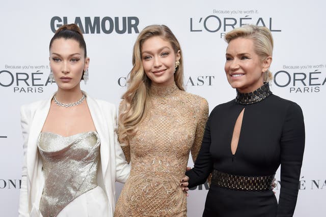 <p>Bella Hadid, Gigi Hadid, and Yolanda Foster attend Glamour’s 2017 Women of The Year Awards </p>