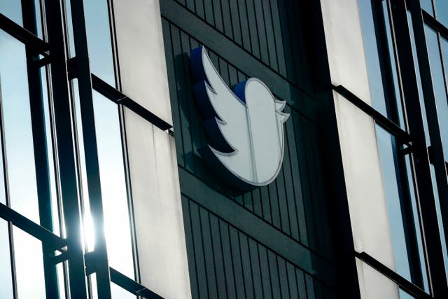 <p>FILE - A Twitter logo hangs outside the company’s offices in San Francisco, on 19 December 2022</p>