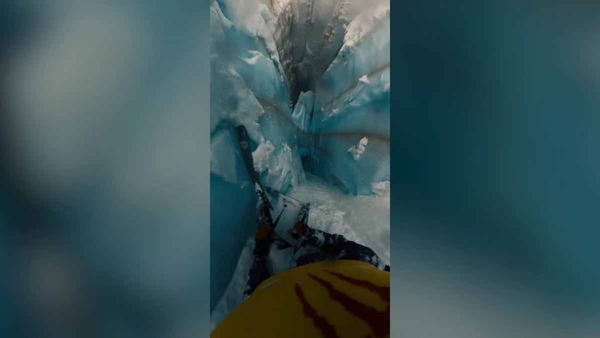 Helmet cam captures heart-stopping moment skier falls into glacier crevasse