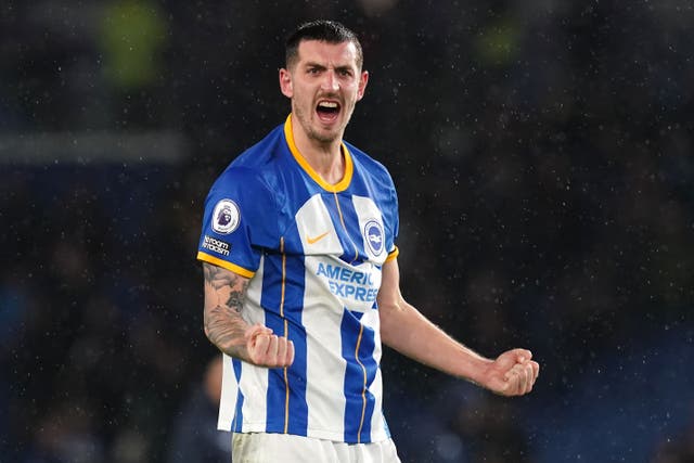 Lewis Dunk is looking forward to nine “humongous” games ahead for Brighton (Gareth Fuller/PA)