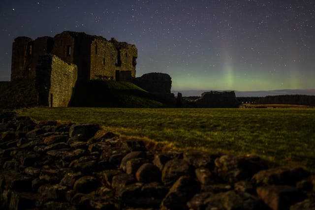 <p>The Aurora Borealis is seen above the ruins of Duffus Castle on February 20, 2021 in Duffus, Scotland</p>