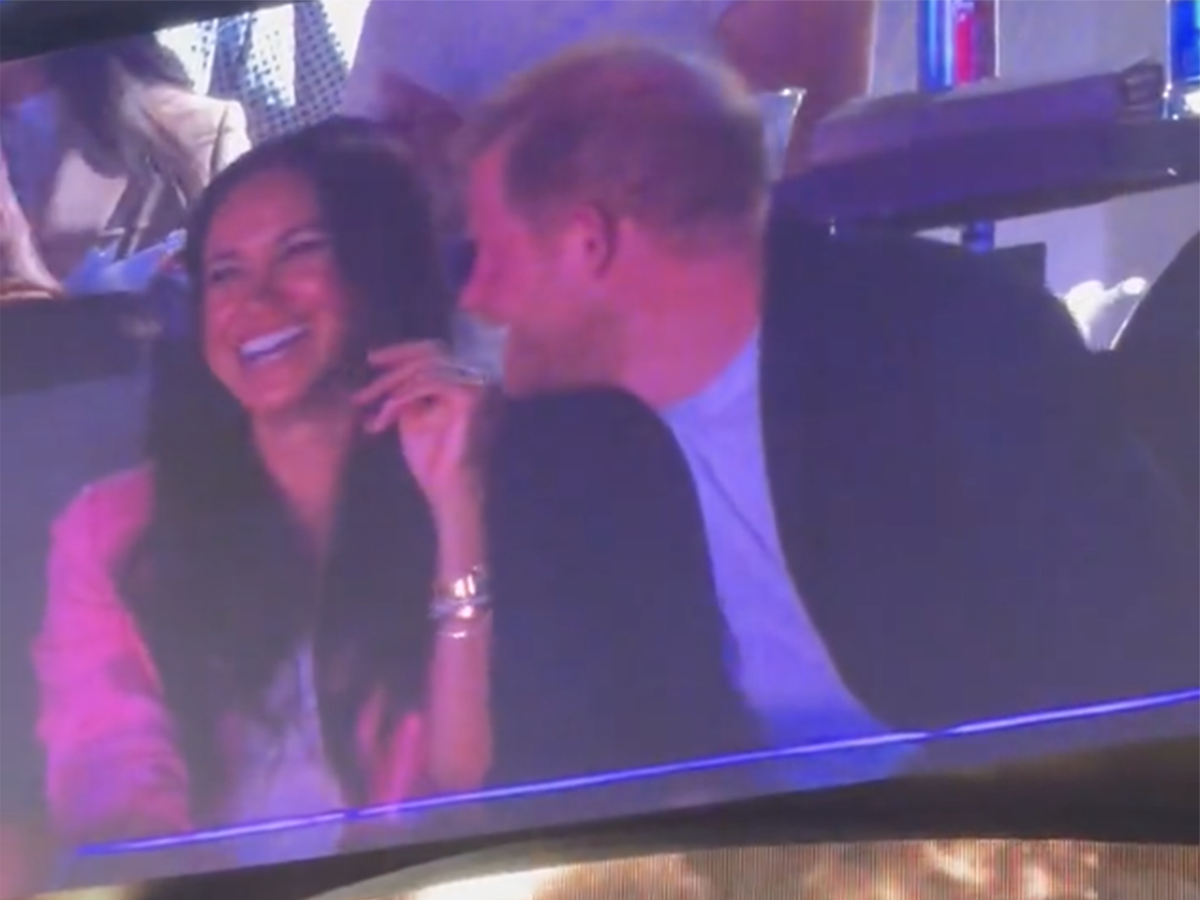 Meghan appears to dodge Harry&rsquo;s advances as couple appear on Jumbotron at Lakers game