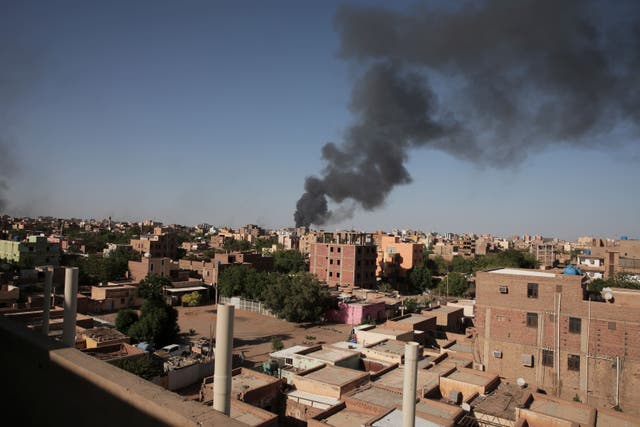 Smoke is seen in Khartoum, Sudan, before Irish citizens were airlifted out on French flights (Marwan Ali/AP/PA)