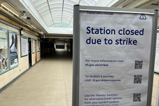 Strike signage at Harrow-on-the-Hill Underground station in north London. RMT workers are being re-balloted over further strike action (Harry Stedman/PA)