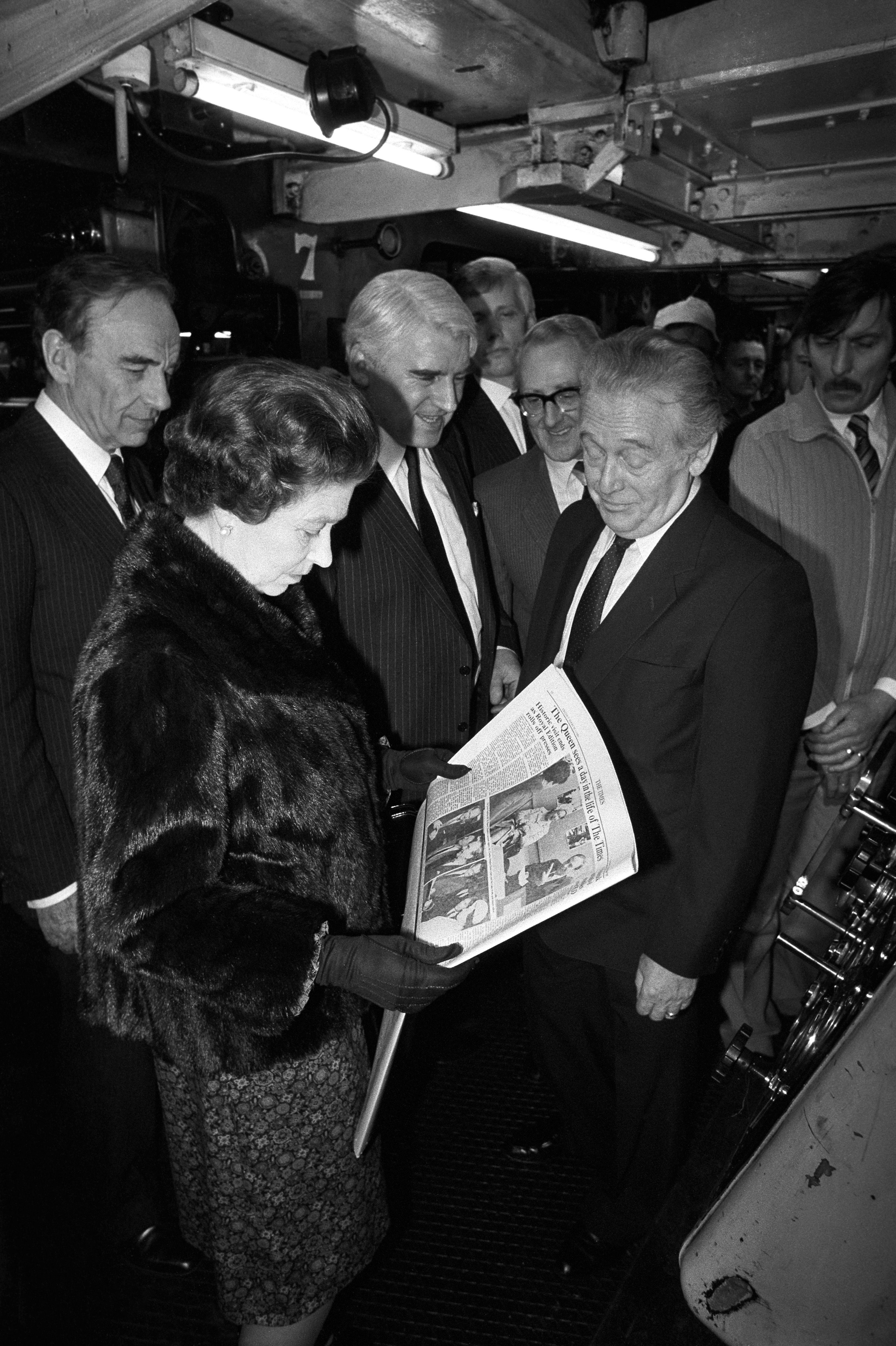 Queen Elizabeth II with proprietor Rupert Murdoch, left, at the Times Newspaper building at Grays Inn Road, London