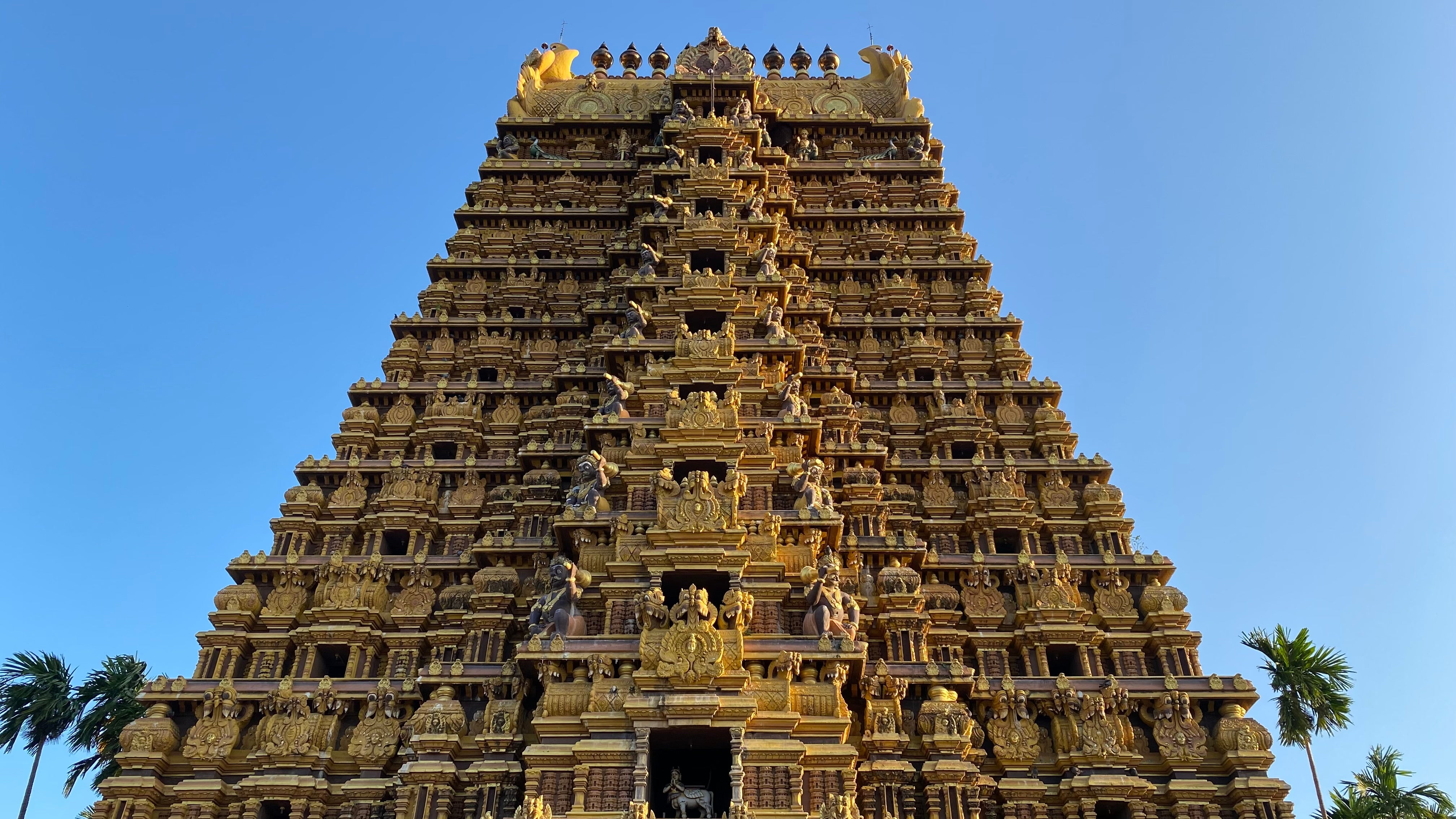 The tower of Nallur Kandaswamy Kovil, a temple in Jaffna, is ornately carved