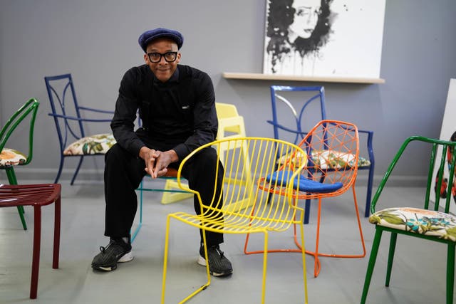 The Repair Shop’s Jay Blades unveils upcycled chairs created for the London Square Community Garden at this year’s Chelsea Flower Show (Jacob King/PA)