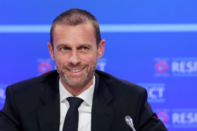 UEFA president Aleksander Ceferin says talks are ongoing over a salary cap in European football (Niall Carson/PA)