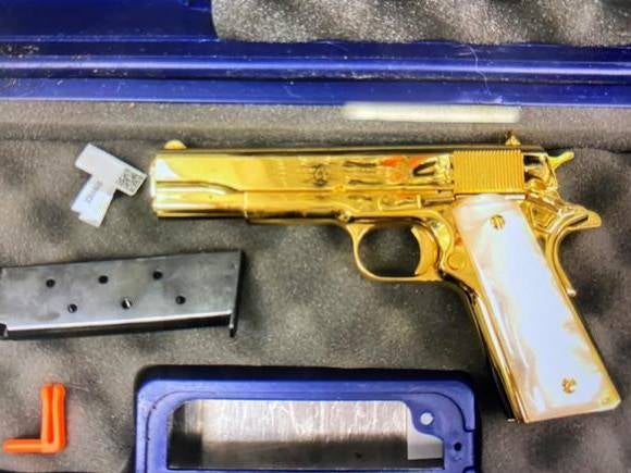 The gold-plated gun recovered from Florida woman