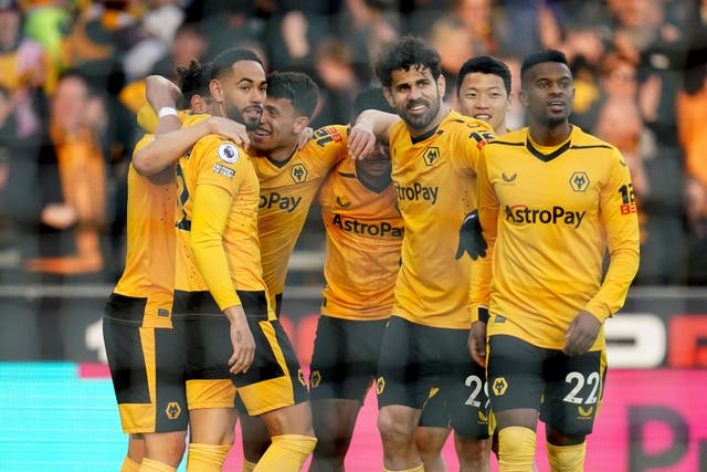 Wolves celebrate their early opener against Crystal Palace (Nick Potts/PA)
