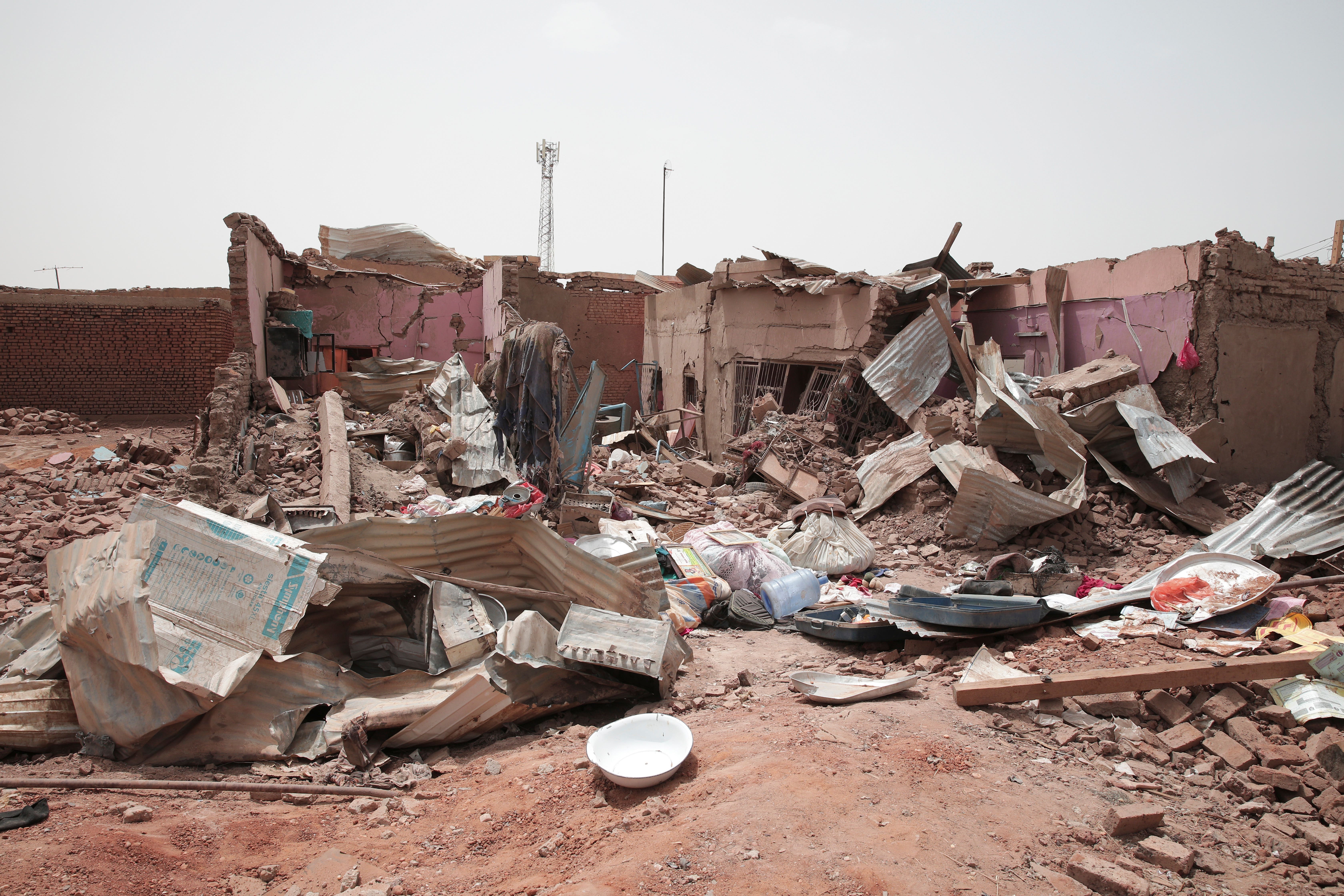 The remains of a house destroyed during the recent fighting in Khartoum, where the retired doctor was shot in the leg