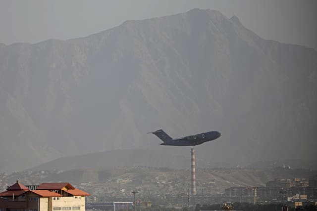 <p>A US Air Force aircraft takes off from the military airport in Kabul on August 27, 2021, as the Pentagon said the evacuation of tens of thousands of people from Afghanistan still faces more possible attacks like the bombing that killed scores of people outside the Kabul airport.</p>