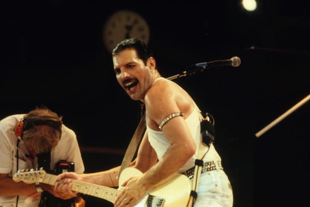 <p>Freddie Mercury on stage with Queen at 1985 charity concert Live Aid (PA)</p>
