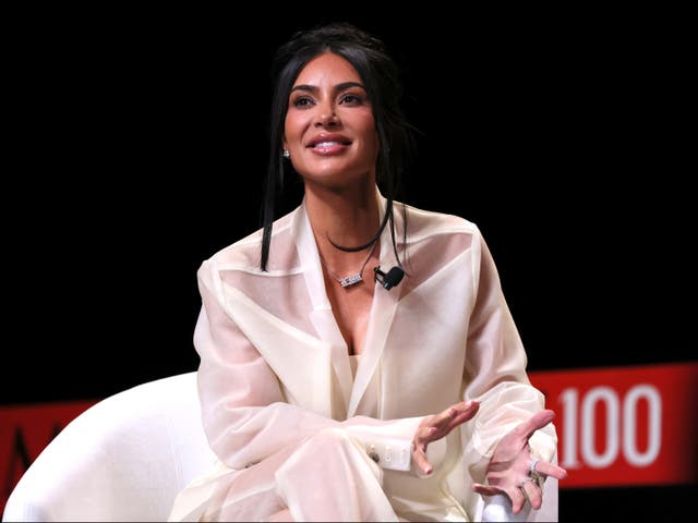 <p>Kim Kardashian speaks onstage at the 2023 TIME100 Summit at Jazz at Lincoln Center on April 25, 2023</p>