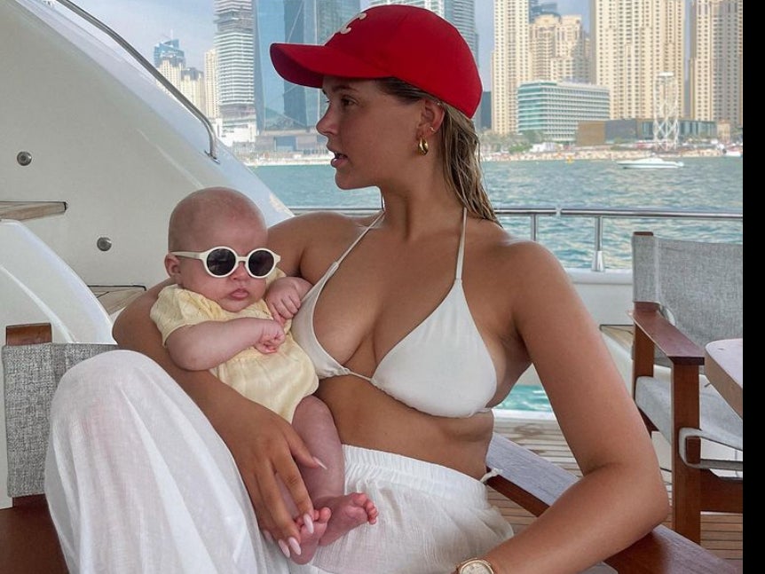 Molly-Mae Hague poses with baby Bambi while on holiday in Dubai