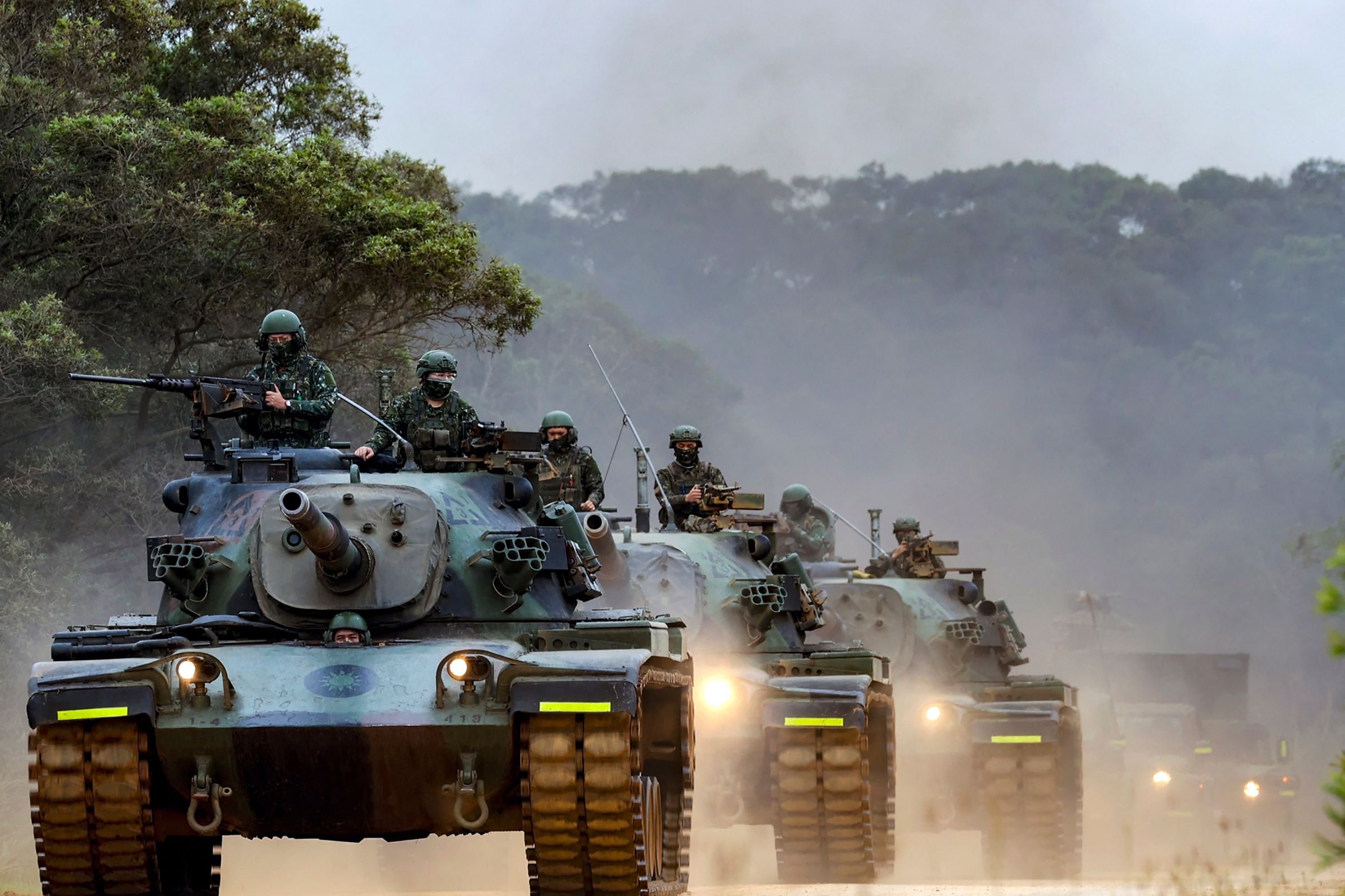 Taiwanese soldiers operating tanks during a drill