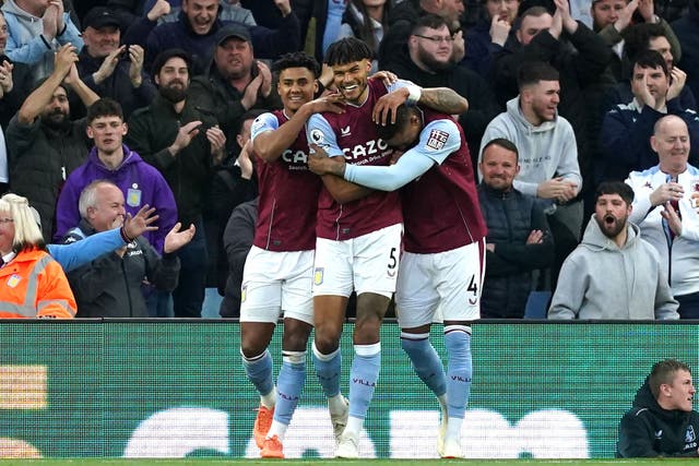 Tyrone Mings (centre) celebrates scoring Aston Villa’s winner against Fulham (Martin Rickett/PA)