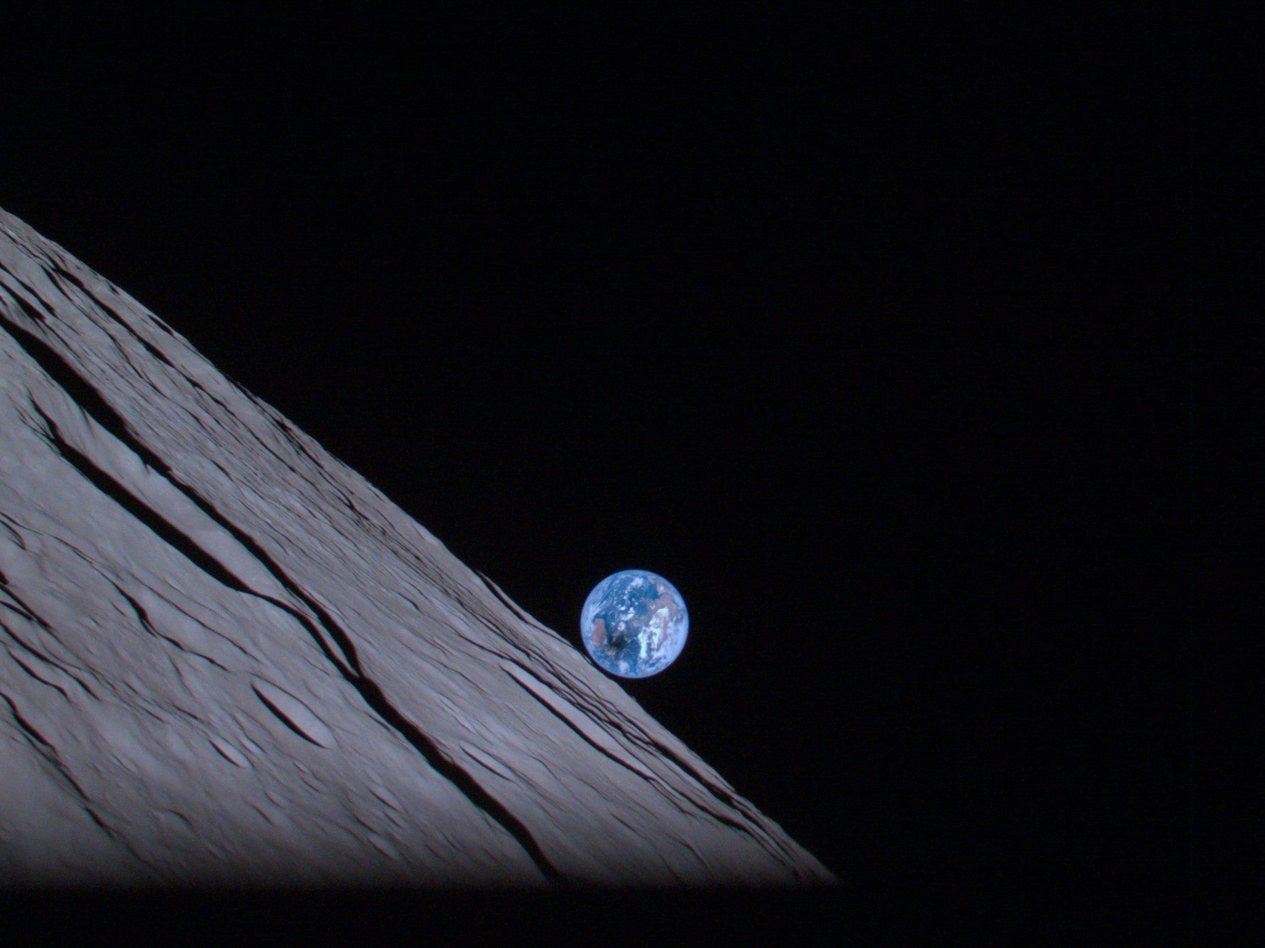 The lunar Earthrise during solar eclipse – captured by the camera of ispace’s Mission 1 lander at an altitude of about 100 km from the lunar surface