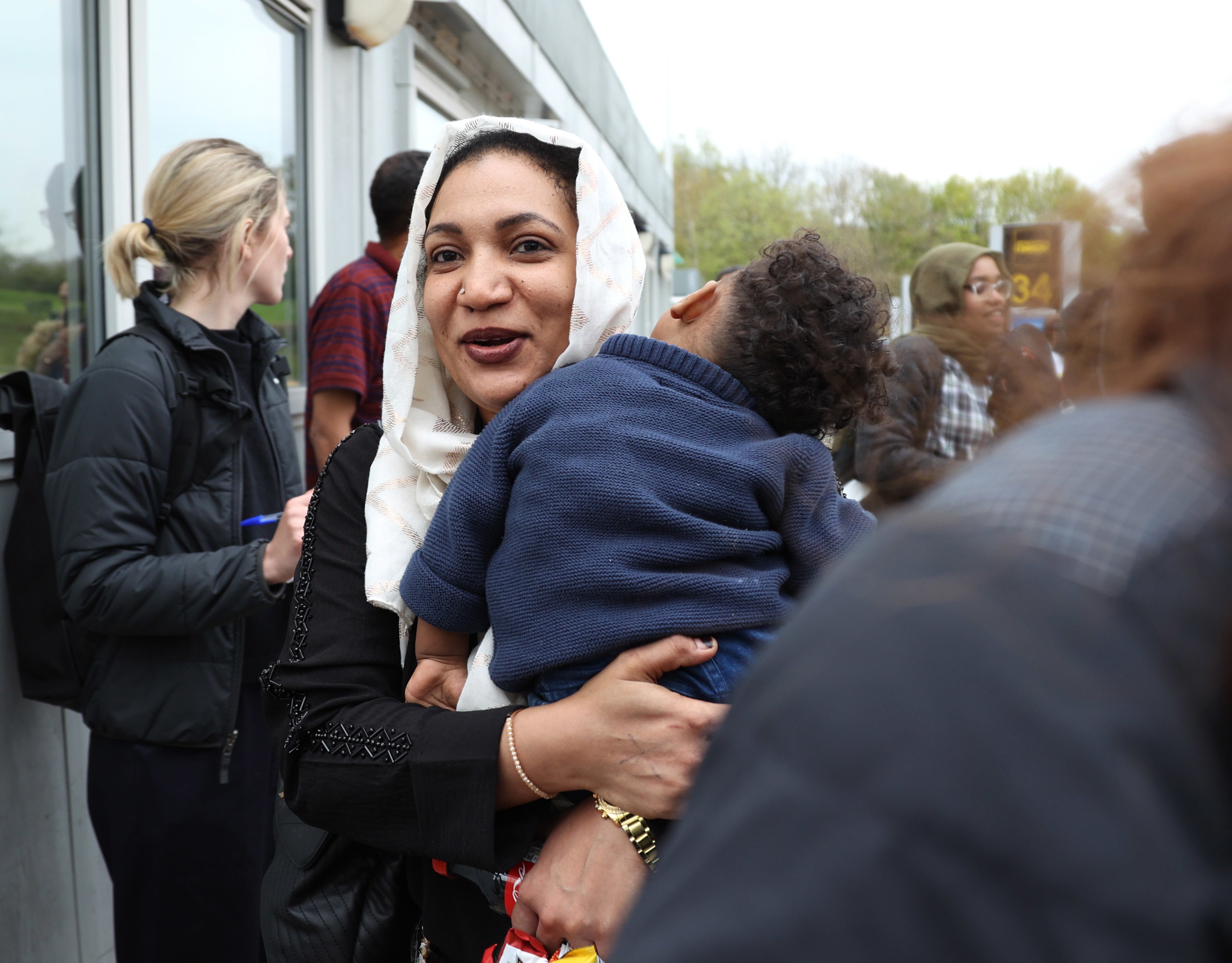 People evacuated from Sudan arrive on a flight from Cyprus into Stansted airport in Essex - but two juniors doctors were flatly denied onboard a British evacuation plane this morning