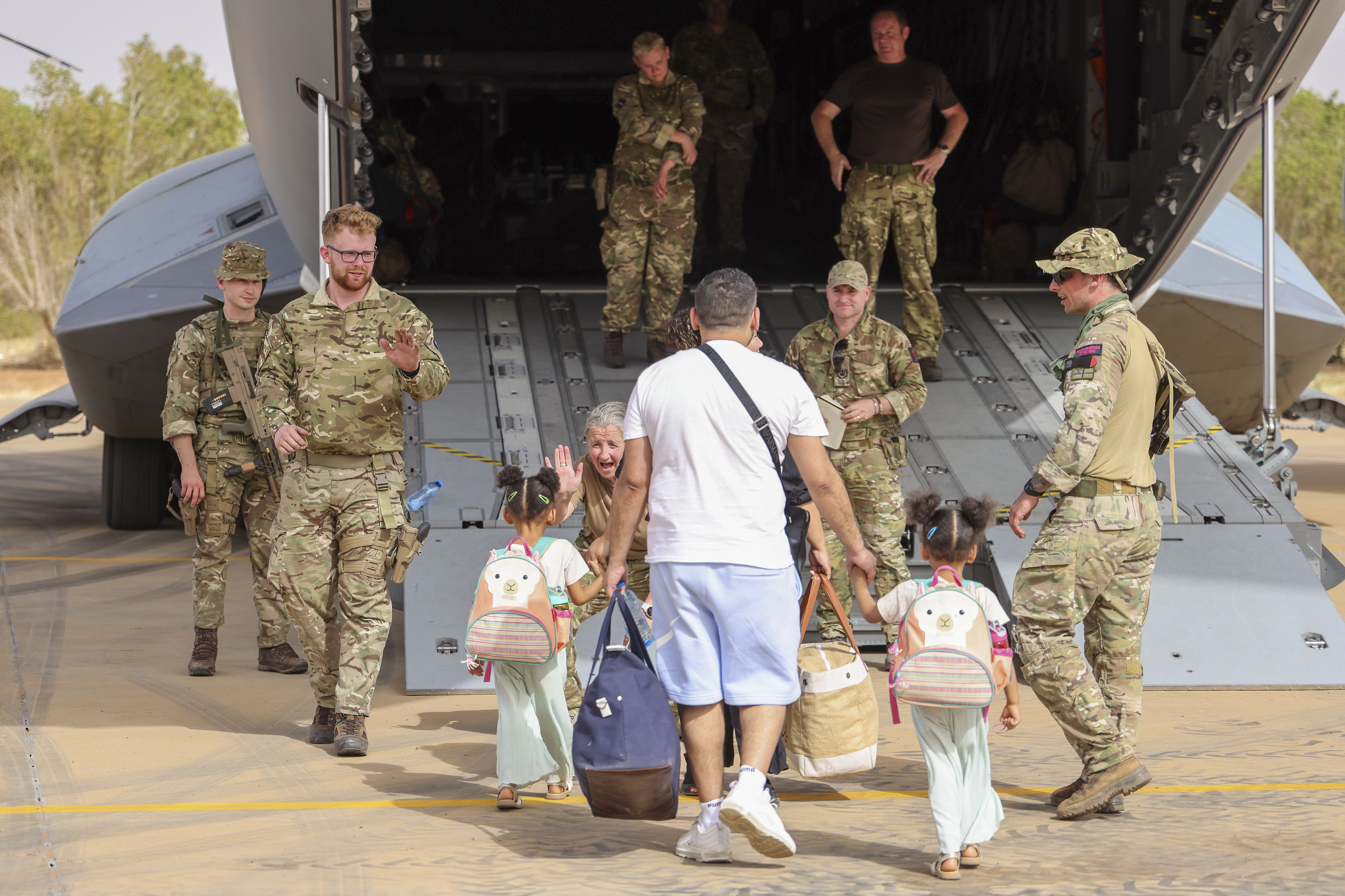 British nationals being evacuated from Khartoum, Sudan by UK military personnel (PO Phot Arron Hoare/PA)