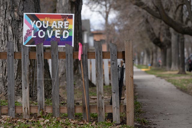 <p>A sign showing support for the LGBTQ community is seen in Missoula, Mont., Tuesday, April 25, 2023</p>