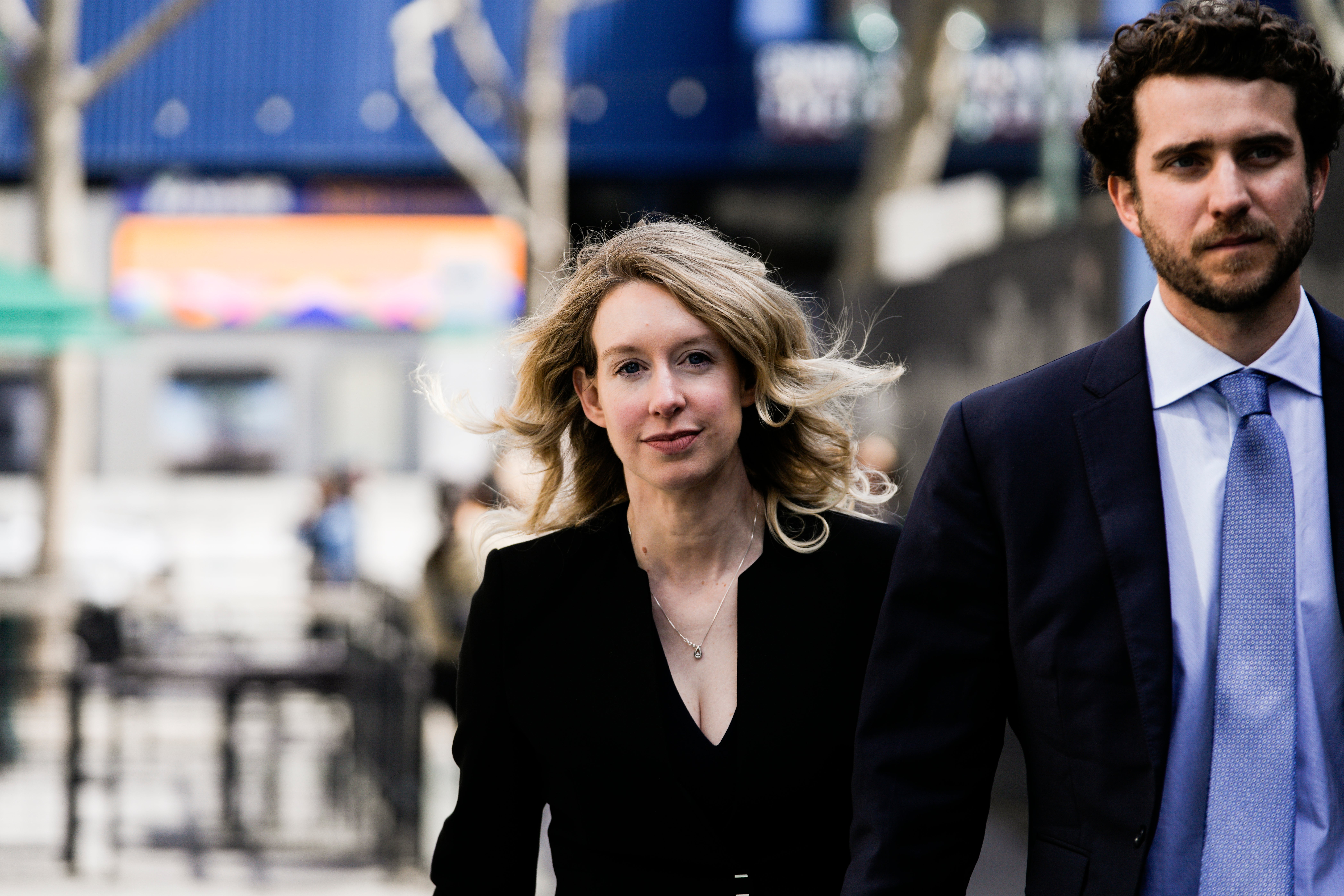 Former Theranos CEO Elizabeth Holmes alongside her boyfriend Billy Evans, walks back to her hotel following a hearing at the Robert E Peckham US Courthouse on 17 March, 2023 in San Jose, California.