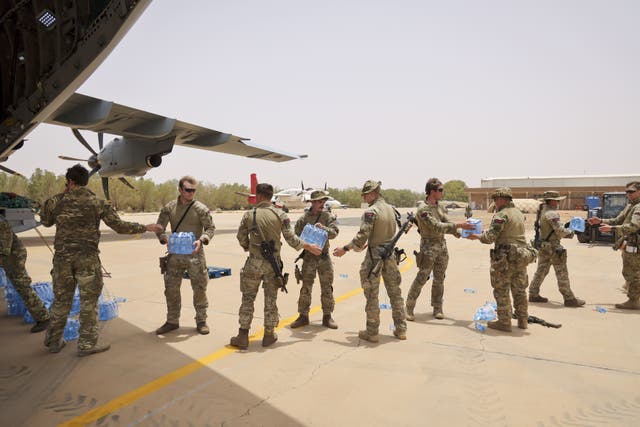 UK military personnel unloading stores in Khartoum for British Nationals who will be evacuated from Sudan (PO Phot Arron Hoare/PA)