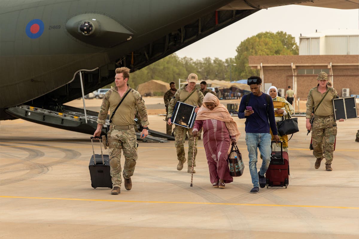 Wounded British doctor’s evacuation fate hangs in balance as he undergoes surgery at Sudan airfield