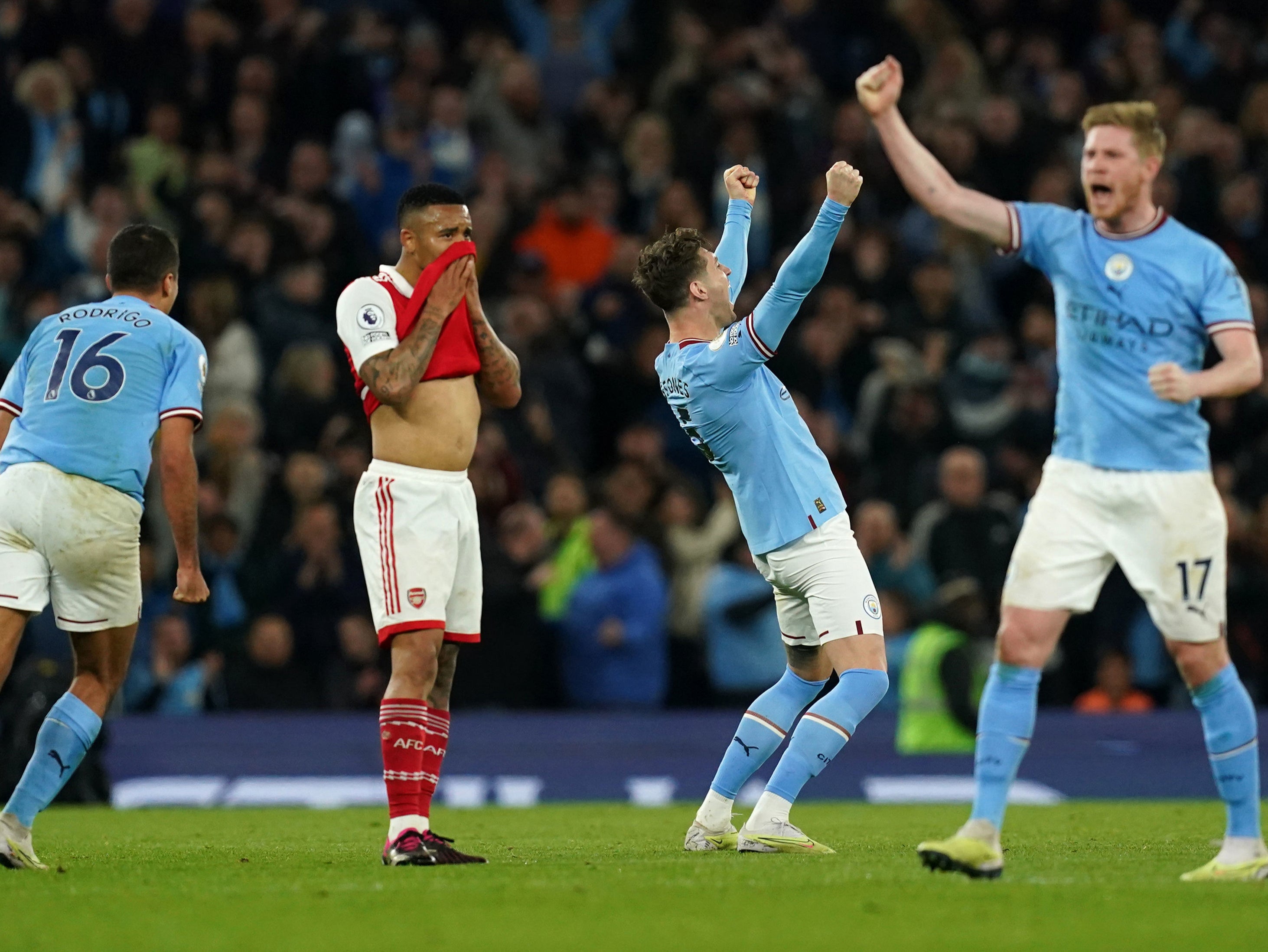 Manchester City players celebrate after VAR awards their second goal