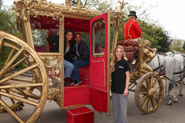 A replica carriage resembling the one King Charles III will ride to his coronation is driven through Dulwich Park (Kieran Cleeves/PA)