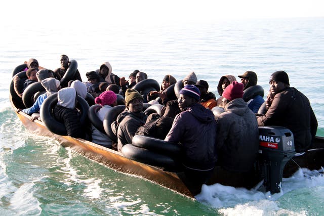 <p>Migrants, mainly from sub-Saharan Africa, are stopped by Tunisian Maritime National Guard at sea during an attempt to get to Italy, near the coast of Sfax, Tunisia, Tuesday, April 18, 2023</p>
