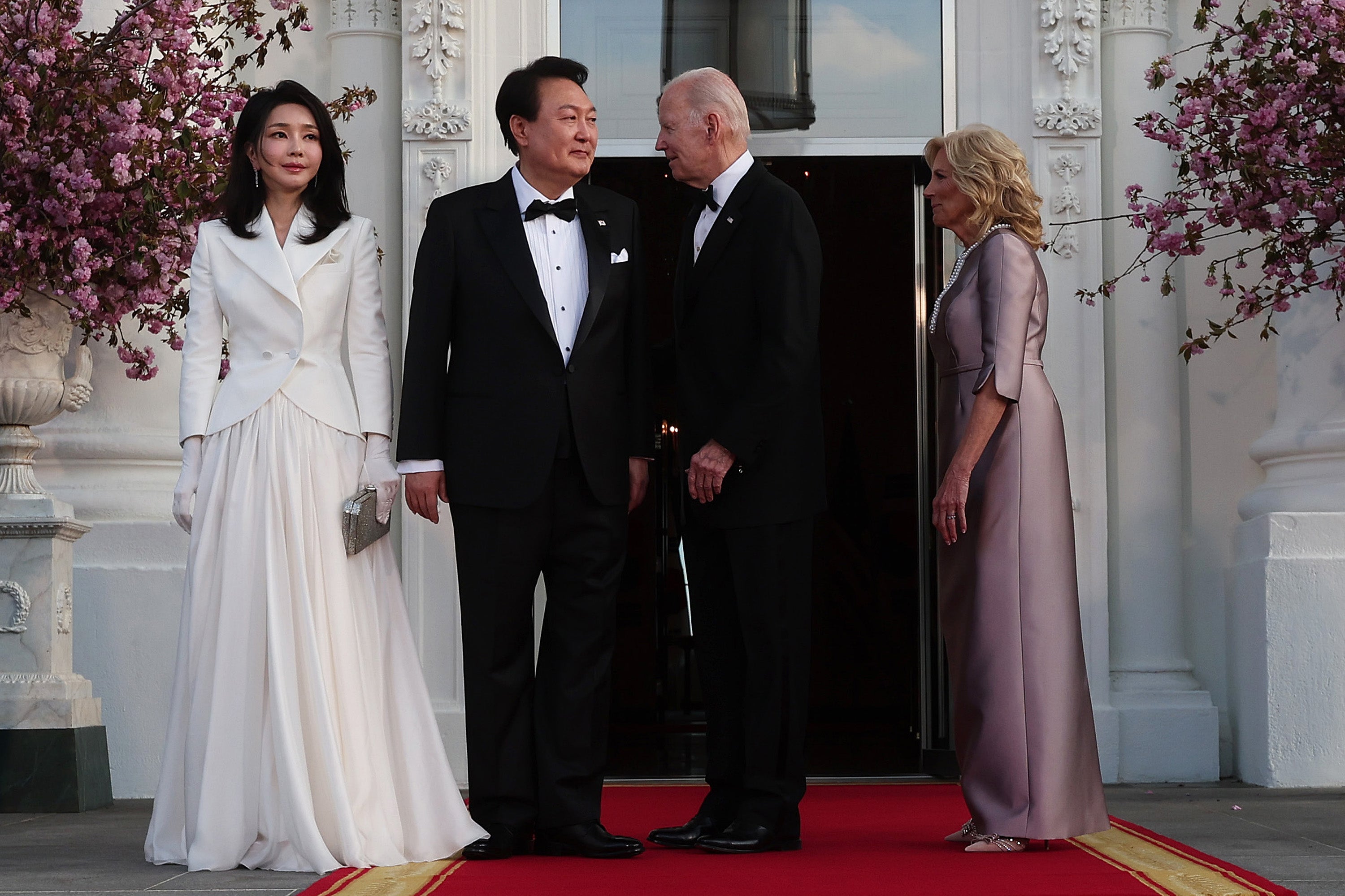 Joe Biden, first lady Jill Biden welcome South Korean president Yoon Suk Yeol and his wife Kim Keon Hee as they arrive at the North Portico of the White House