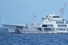 Chinese ship blocks Philippine vessel as journalists watch