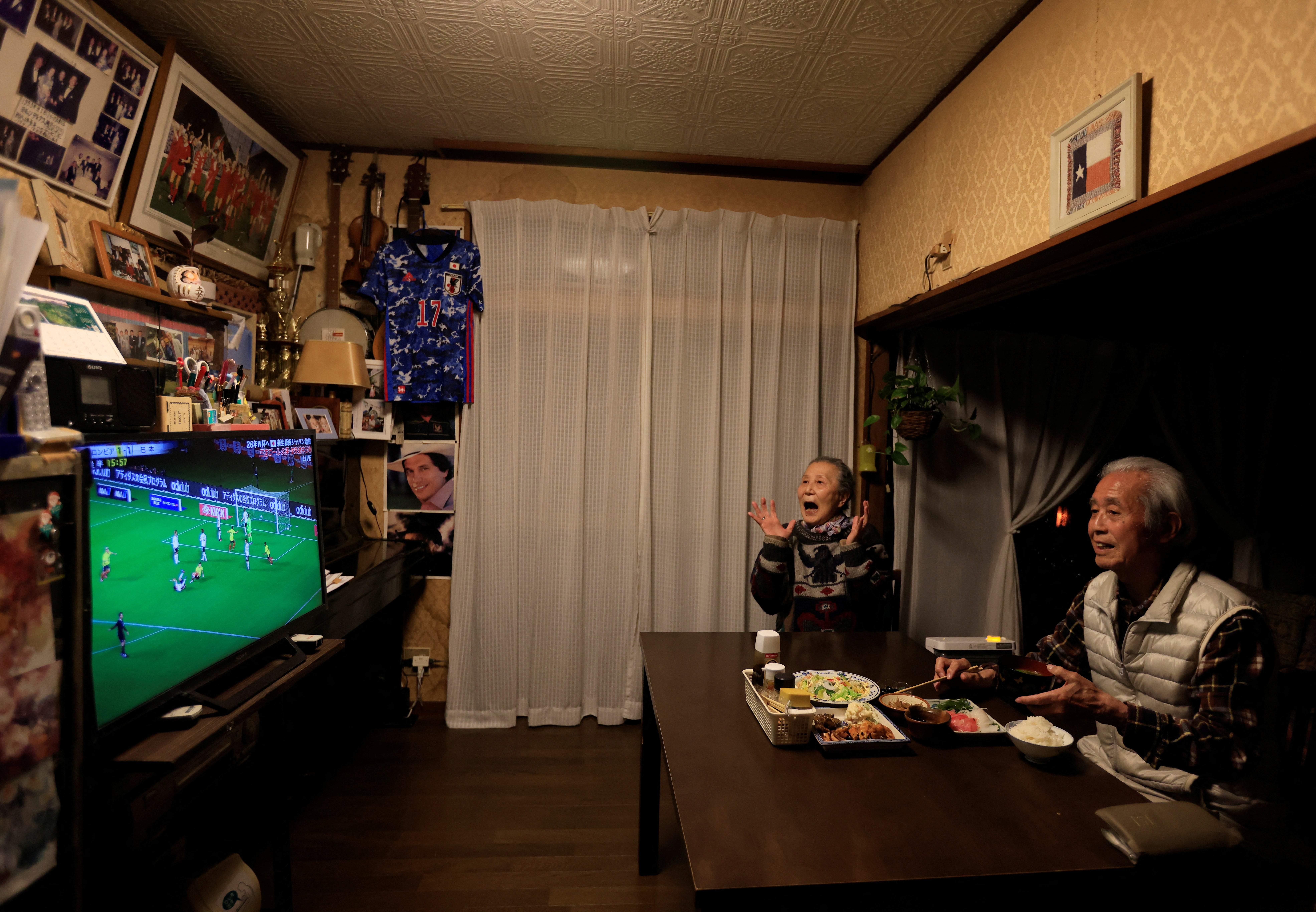 Nomura and his wife watch the Japanese national team against Colombia in March