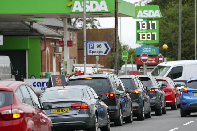 A union representing workers at Asda has warned a potential merger of the supermarket with petrol forecourt business EG Group could risk jobs, food supplies and monopolise petrol stations across the UK (Steve Parsons/ PA)