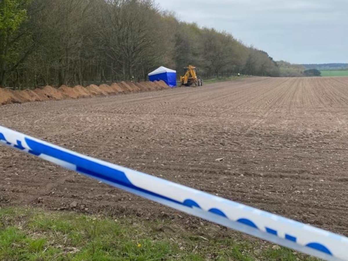 Police investigation after human remains found in field