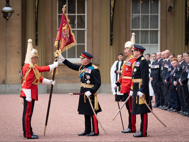 <p>King Charles III presents new Standards and Colours to the Life Guards of the Household Cavalry Mounted Regiment at Buckingham Palace on April 27, 2023</p>