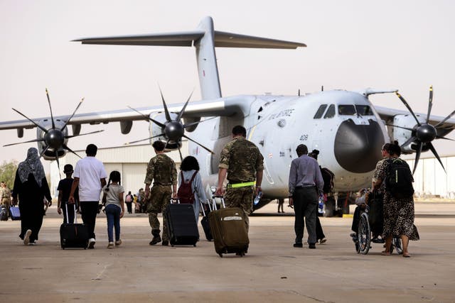 British nationals board an RAF aircraft in Khartoum (MoD/PA)
