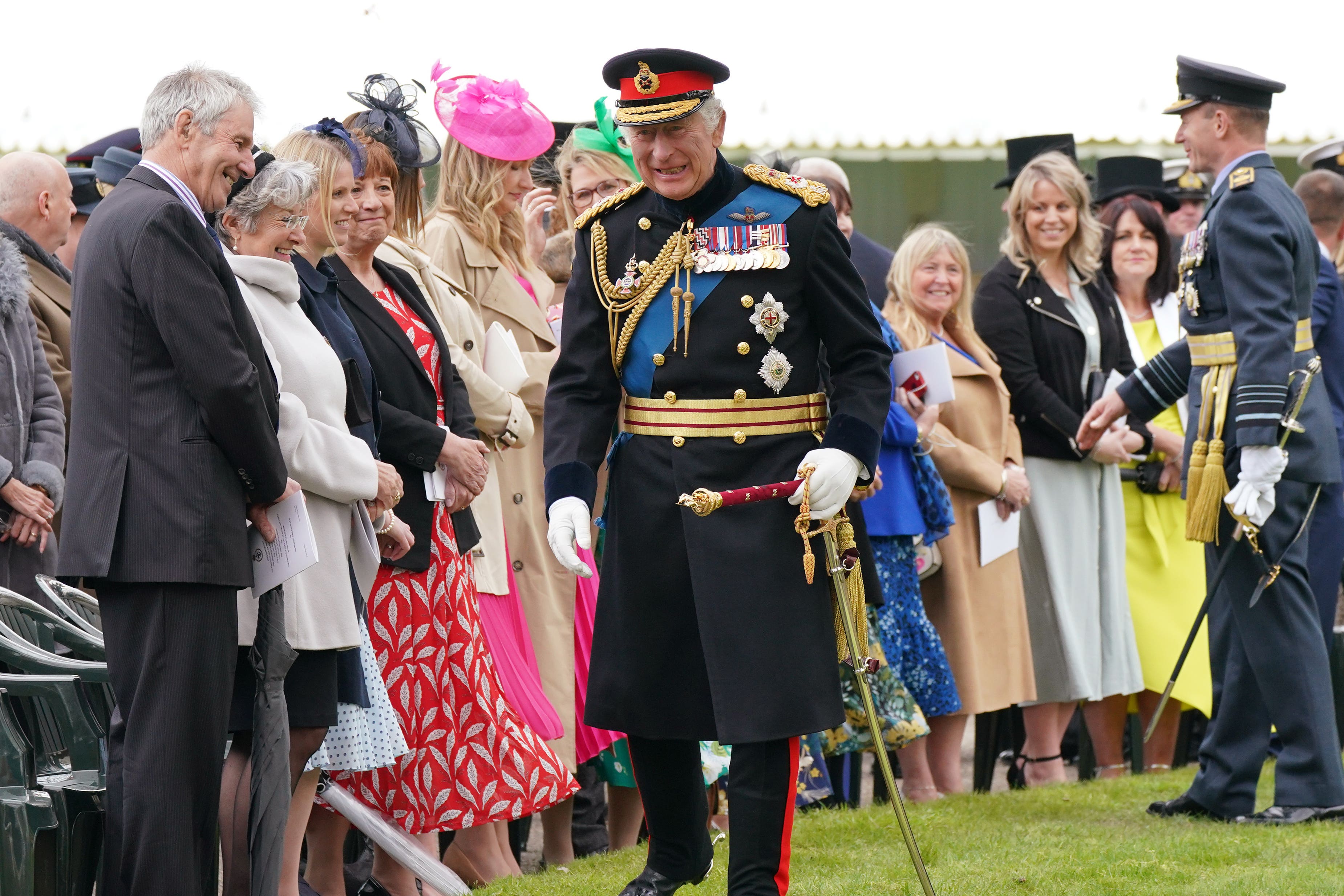 The King meeting guests after a ceremony where he presented new Standards and Colours to the armed forces (Yui Mok/PA)