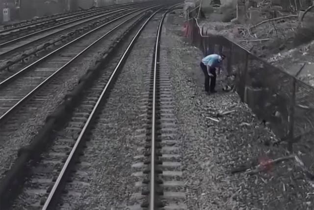 Child Rescued Train Tracks