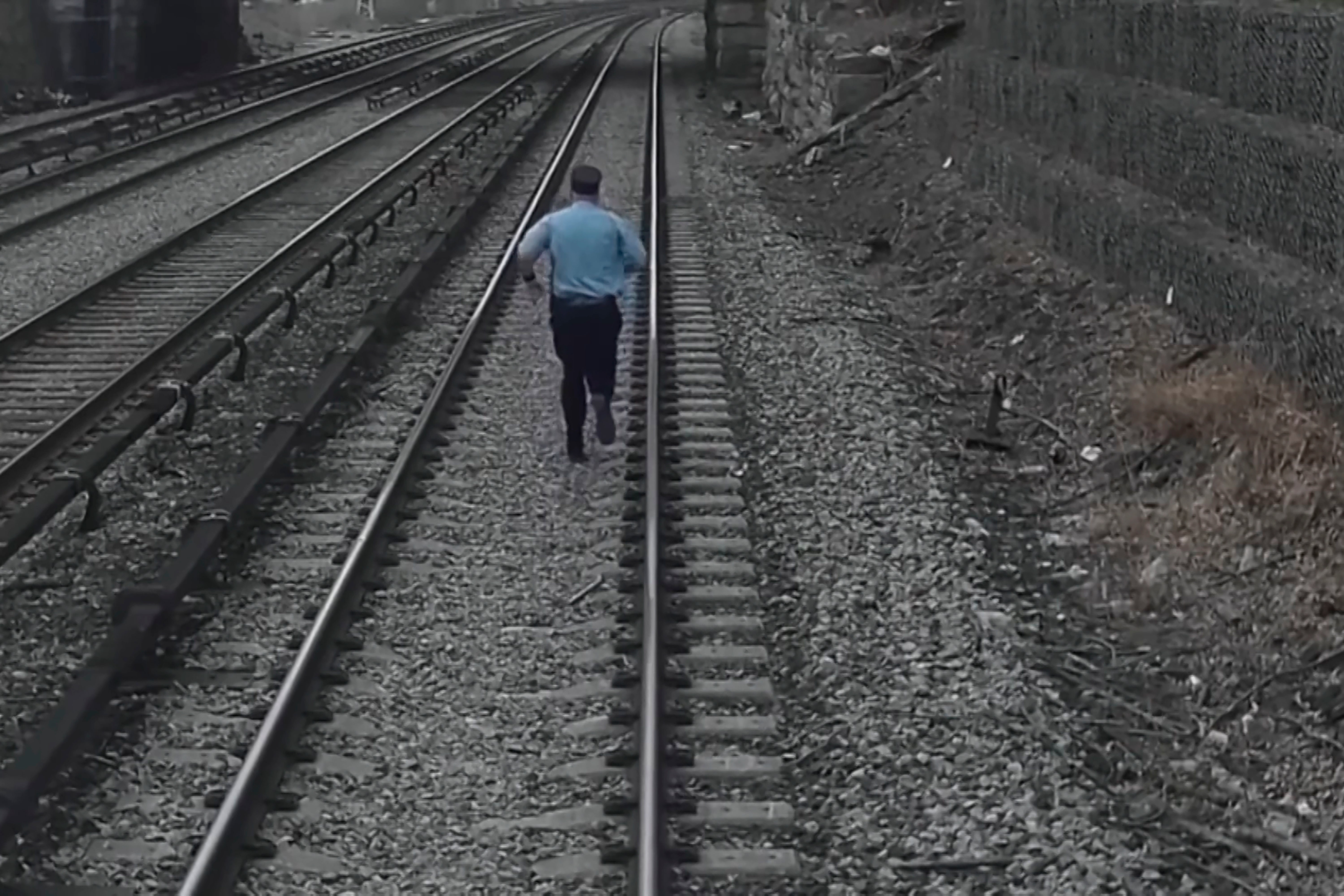 Child Rescued Train Tracks