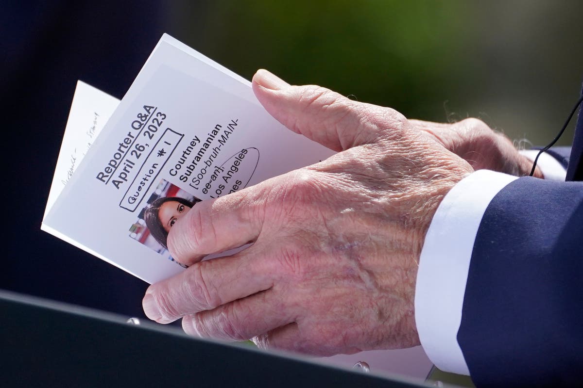Newspaper denies submitting advance questions as Biden snapped with reporter’s card in hand