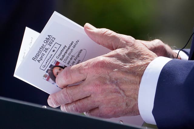 <p>An image of Los Angeles Times correspondent Courtney Subramanian is seen as President Joe Biden looks through notes during a news conference with South Korea's President Yoon Suk Yeol in the Rose Garden of the White House on Wednesday, April 26, 2023</p>