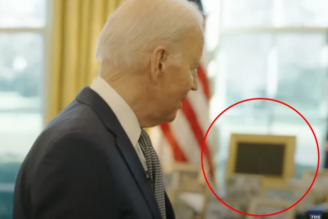 <p>The apparent TV in a gold frame that President Biden is said to watch in the Oval Office</p>