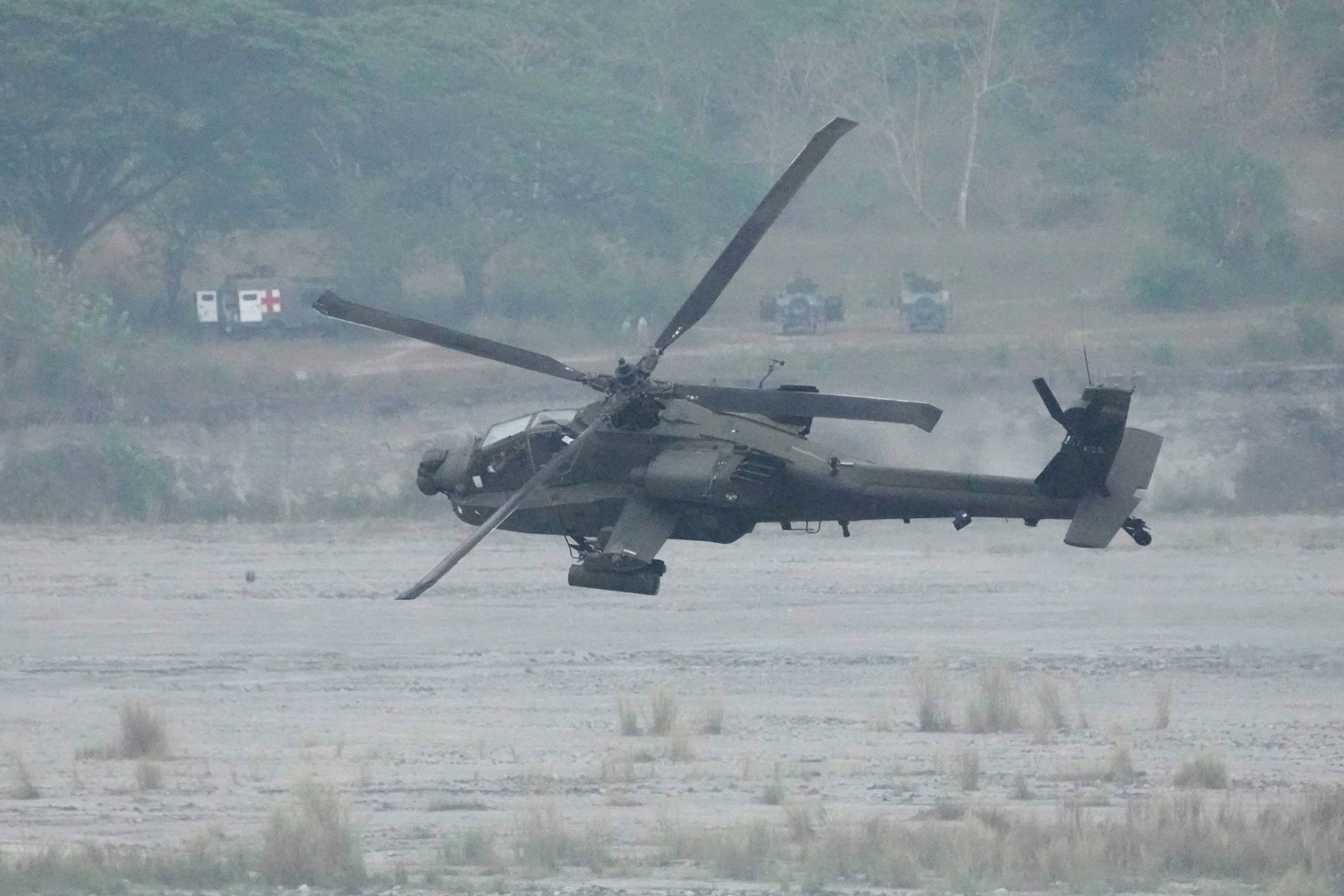 File: A US Apache helicopter maneuvers during a joint military exercise in Philippines on Friday, 14 April 2023