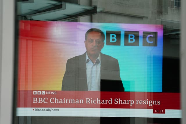 A screen showing a news report seen through the windows of the BBC in central London, after Richard Sharp announced he was quitting as BBC chairman to “prioritise the interests” of the broadcaster after a report by Adam Heppinstall KC found he breached the governance code for public appointments (Jordan Pettitt/PA)